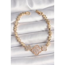 Clariss Pirinç Gold Renk Zirkon Taşlı Yonca Model Zincir Kadın Bileklik