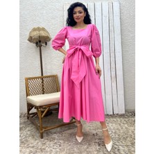 Pembe Uzun Fiyonklu Kloş Poplin Elbise