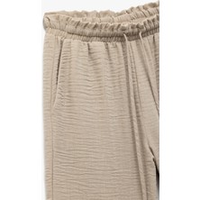 Beli Bağlamalı Lastikli Cepli Bol Paça Pantolon