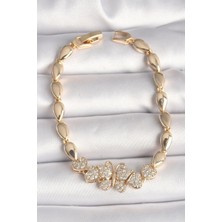 Clariss Pirinç Gold Renk Zirkon Taşlı Kelebek Figür Damla Zincir Model Kadın Bileklik