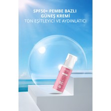 Just Art Ton Eşitleyici Yüksek Koruma Etkili SPF50+ Aydınlatıcı Pembe Yüz Güneş Kremi 100ML