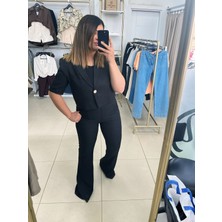 Quzu marka 
Kısa Blazer -İspanyol paça pantolon Takım 
Siyah rengi 