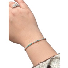 Pembe ve Turkuaz Taşlı Tek Sıra Lastikli Bileklik