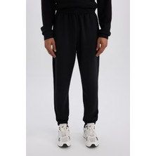 DeFacto Ultra Yumuşak Standart Fit Sporcu Jogger Eşofman Altı İçi Tüylü Skuba Dalgıç Kumaş Lastikli Paça D7525AX25SP