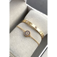 Mavi Taşlı Asansörlü Bileklik ve Gold Renk Kelepçe Konbini