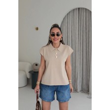 Lavida Rahat Kalıp Polo Yaka Düşük Kol Gold Düğme Detaylı Merserize Kadın Bluz