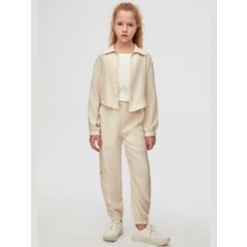 Kız Çocuk Pamuklu Ince Paçaları ve Beli Lastikli Frozen Pantolon