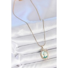 316L Çelik Gold Renk Zincir Mavi Mineli Çiçek Işlemeli Zirkon Taş Detaylı Portre Model Kadın Kolye - Bamido