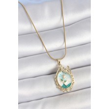 316L Çelik Gold Renk Zincir Mavi Mineli Çiçek Işlemeli Zirkon Taş Detaylı Portre Model Kadın Kolye