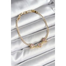 Pirinç Sıralı Pembe Kalp Figürlü Zirkon Taşlı Gold Renk Kadın Bileklik