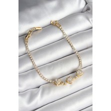 Pirinç Sıralı Kalp Figürlü Zirkon Taşlı Gold Renk Kadın Bileklik - EBJ250530W34294