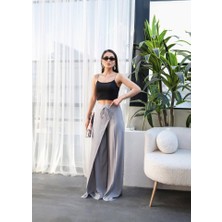 Nidam Butik Keten Önü Çapraz Parçali Lasti̇kli̇ ve Bağcikli Geni̇ş Paça Pantolon