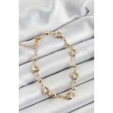 Pirinç Şeffaf Kalp Model Gold Renk Zirkon Taşlı Kadın Bileklik