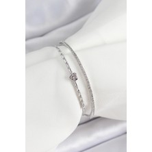 Pirinç Gümüş Renk Zirkon Taşlı Kalp Detaylı Kadın Bileklik