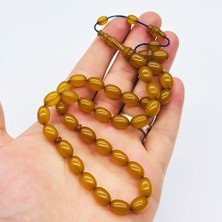 Koyu Sarı Renkte Sıkma Ateş Kehribar Tesbih