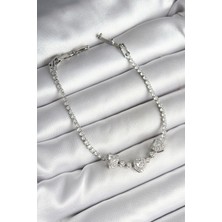 Kuşkaya Ticaret Pirinç Sıralı Kalp Figürlü Zirkon Taşlı Gümüş Renk Kadın Bileklik