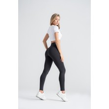 Kadın Toparlayıcı Tayt – Siyah Nervürlü Yüksek Bel Slim Fit, Dar Paça Sporcu Tayt