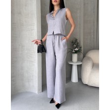 Modemoss  Kolsuz  Bluz  ve Yüksek Bel Bol Paça Pantolon Takım .