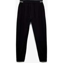 Koton Beli Lastikli Paraşüt Kumaş Şerit Detaylı Jogger Spor Eşofman Altı