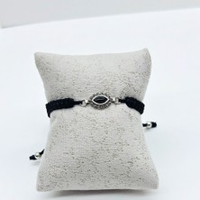 Örgü Ipli Zirkon ve Oltu Taşı Işçilikli 925 Ayar Gümü?