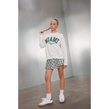 DeFacto Okul Beli Lastikli Pileli Ekose Şort Etek Kız Çocuk C7296A824AU