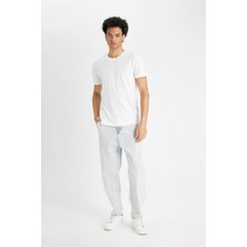 DeFacto %100 Pamuk Relaxed Slouchy Fit Rahat Kesim Havuç Kalıp Normal Bel Daralan Paça Jean Pantolon B8321AX24AU