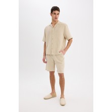 DeFacto %100 Pamuk Relax Fit Müslin Cepli Basic Düz Bermuda Şort C7589AX25SM