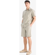 DeFacto %100 Pamuk Relax Fit Cepli Keten Görünümlü Bermuda Şort C7381AX25SM