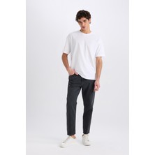 DeFacto %100 Pamuk 90's Slim Fit Dar Kalıp Yüksek Bel Dar Paça Yıkamalı Siyah Jean Pantolon D8587AX25SP