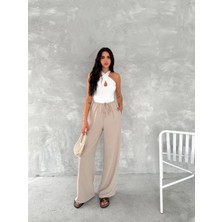 Mzp Kartan Ayrobin Oversize Kadın Pantalon Bej Dokuma Kumaş Geniş Paça Modeli ile Rahat Kullanım