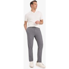 DeFacto Beli Bağcıklı Lastikli Cepli Jogger Fit Her Yöne Esneyen Yumuşak Tuşe Pantolon A9943AX25AU