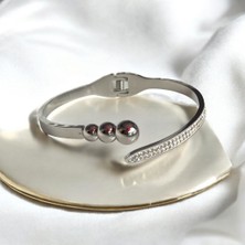 Yuvarlak Top Detaylı ve Taşlı Kadın Çelik Kelepçe