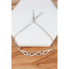 Sonsuzluk Motifli Rodyumlu Zirkon Taşlı Gümüş Bayan Bileklik