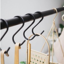 1. 5 Adet 10 cm Tel Pano Kanca, Metal ve Makrome, Mutfak ve S Kanca  
2. Siyah 5'li Tel Pano Kanca Seti, Metal ve Makrome, 10 Cm, Mutfak Kullanımı  
3. 10 cm Siyah Tel Pano Kanca, 5