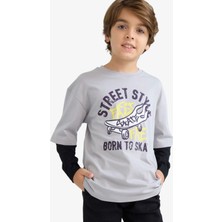 DeFacto Erkek Çocuk Oversize Geniş Kalıp Bisiklet Yaka Baskılı Uzun Kollu Tişört E9590A825AU