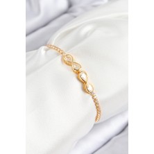 Pirinç Zirkon Taşlı Sonsuzluk Model Gold Renk Asansörlü Kadın Bileklik