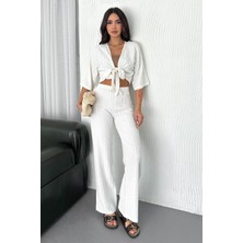 Kadın Bağlamalı Crop Bluz & Çizgili Bol Paça Kimono Pantolon Takımı – Yazlık Şıklık