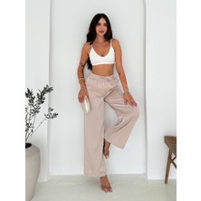 Kadın Parlak Saten Bol Paça Pantolon – Rahat Kesim & Şehirli Stil