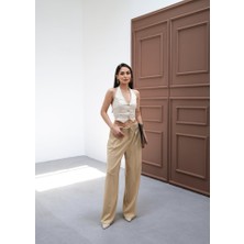 Beli̇ Lasti̇k ve Bağcikli Geni̇ş Paça Pantolon