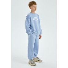 Erkek Çocuk Pamuklu Bebe Mavi Oversize Eşofman Takım - Baskılı Sweatshirt ve Eşofman Altı