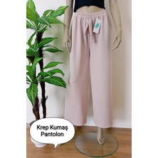 Kadın Bej Dökümlü Krep Kumaş Beli Lastikli Bol Paça Pantolon