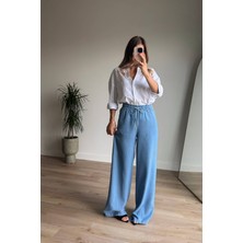 Mavi Beli Lastikli Bol Paça Salaş Model Ince Kot Pantolon