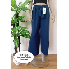 Kadın Yumuşak Dokulu Düz Kesim Geniş Paçalı Esnek Pantolon