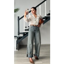 Mavi Tintli Paça Katlama Detaylı Jean