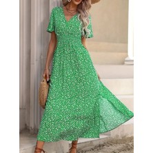 Kadın Kısa Kollu Kruvaze Yaka Beli Lastikli Yanlardan Yırtmaçlı Uzun Çiçekli Elbise