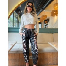 Kadın Bel ve Paça Lastikli Detay Yanları Leopar Detay Bağcıklı Deri Pantolon