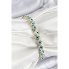 Pirinç Zirkon Taşlı Turkuaz Nazar Model Gold Renk Lastikli Kadın Bileklik