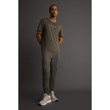 DeFacto Slim Fit Dar Kesim Çift Cepli Dokuma Jogger Eşofman Altı B2780AX25AU