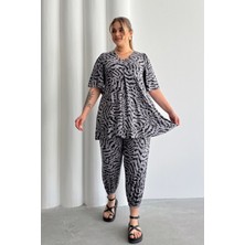 Büyük Beden V Yaka Kısa Kollu Eteği Bollaşan Desenli Bluz 99-5