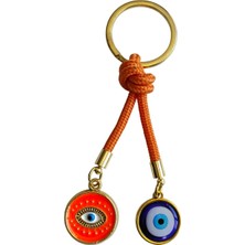 Çift Nazar Boncuklu Anahtarlık – Turuncu Ipli Şans ve Koruma Sembolü Göz Motifli Metal Anahtarlık